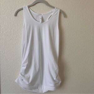 Athleta White  Speed light Tank Large see picture of small stain